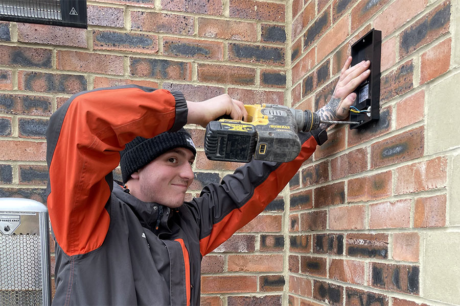 Drilling and installation work by J.C. Bullock & Son Ltd demonstrating qualifications and professional electricians